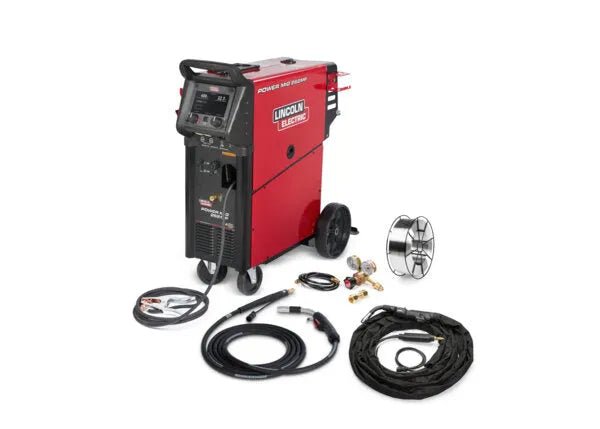 Lincoln Power MIG 262MP Multi-Process Welder on wheels with cables, hoses, wire spool, and connectors for aluminum welding.