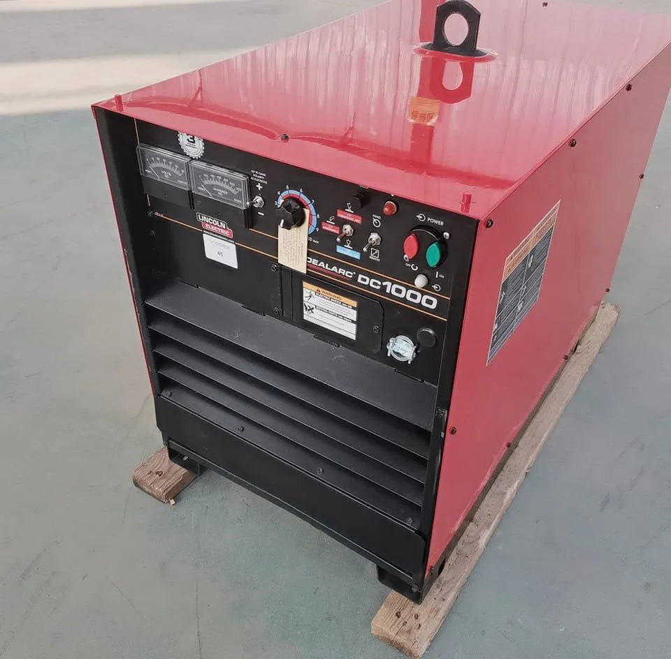 Lincoln Idealarc DC-1000 Subarc Welder U1386-3, industrial welding equipment with control dials, on pallet at WeldingMart.