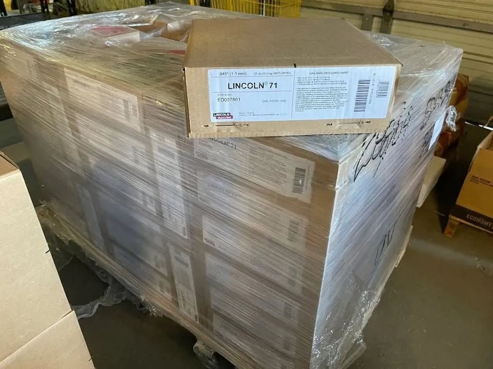 Warehouse pallet with Lincoln 71 T1 .045" welding wire spools, 33lb boxes, 50 per pallet, total 1,650 lbs, ED037801.