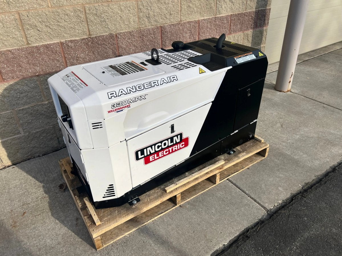 Lincoln Ranger Air 330MPX Multi-Function Engine Drive U5239-1 welding equipment in white and black displayed on pallet at WeldingMart.