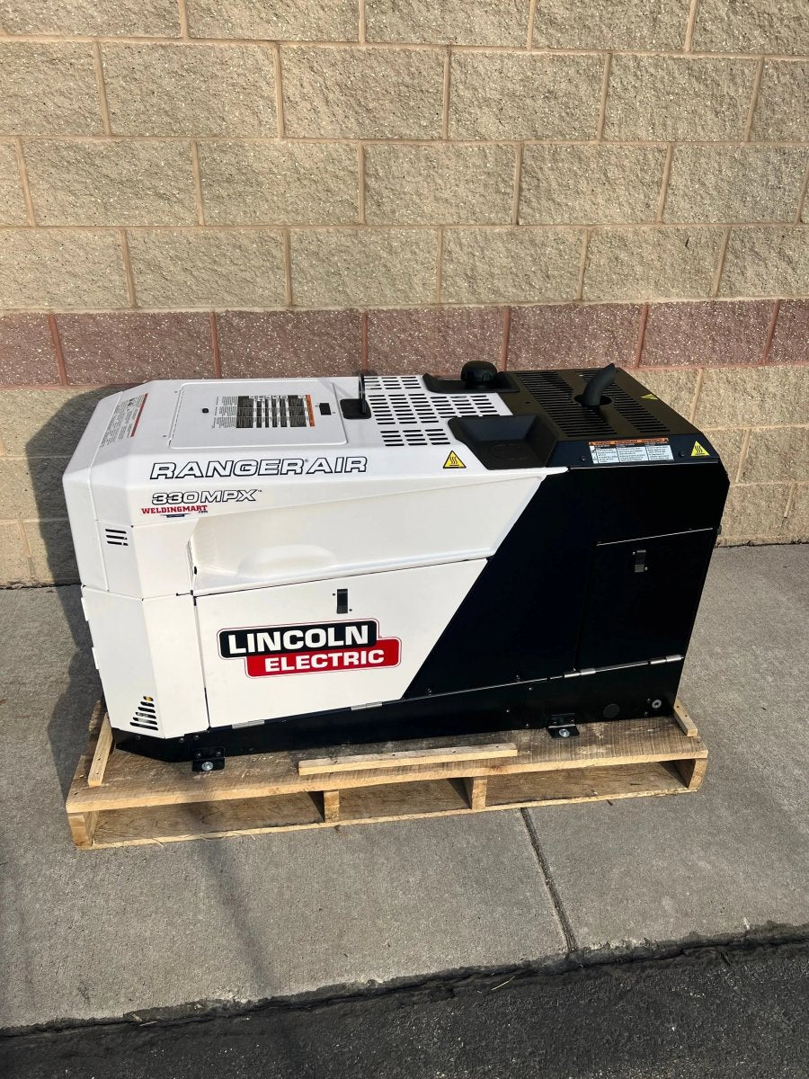 Lincoln Ranger Air 330MPX Multi-Function Welder on pallet, white with red/black trim, factory demo, exterior, WeldingMart equipment.