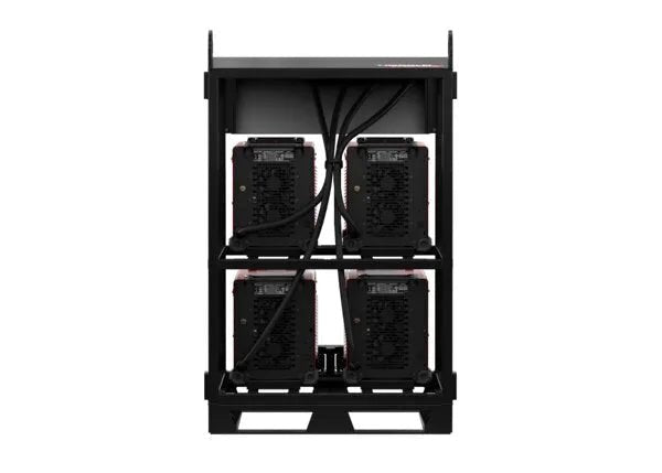 A Lincoln K4726-2 Flextec 350X PowerConnect 4-Pack Rack features an open black frame with four welders, each in its own bay, arranged in two rows of two, connected by visible cables and metal supports.