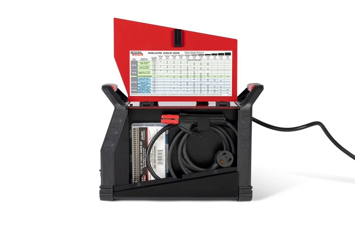Lincoln Square Wave 205 TIG Welder (K5613-1) in black & red, open lid showing cables and table, AC/DC welding machine plugged in.
