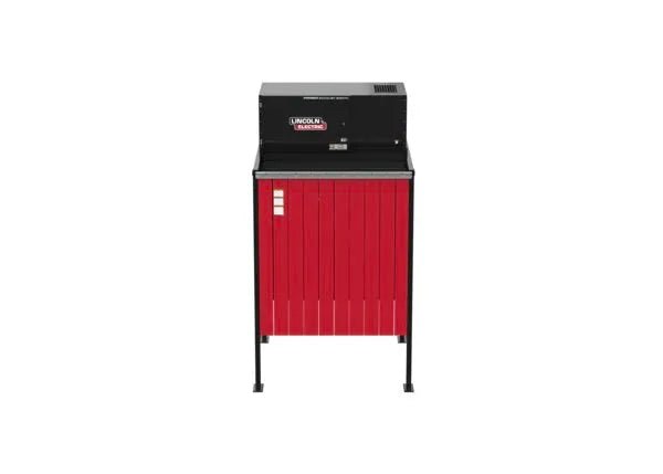 The Lincoln Prism Exhaust Booth Side-by-Side Add-On (K5664-6) is a red and black industrial fume extraction unit with Lincoln Electric branding, vented upper section, and control panel, shown on four legs against a plain white background. 230V, 1 Phase.