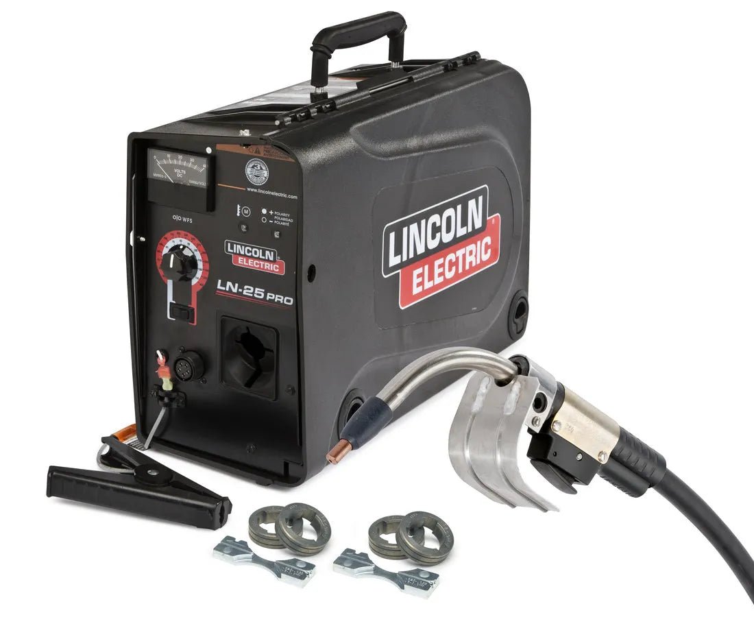 A black Lincoln K4101-3 LN-25 PRO /MAGNUM 400 045C- ONE-PAK wire feeder welding machine with red and white branding, featuring attached cables, clamps, and accessories arranged in front.