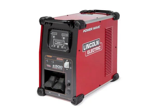The Lincoln Power Wave S500 Advanced Process Factory Demo Welder (U2904-1) stands upright with a red and black design, featuring a front control panel with dials, switches, display screens, black corner protectors, and side ventilation slits.