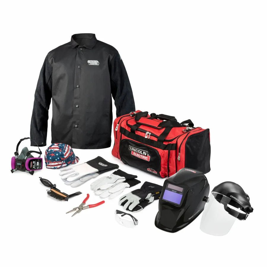 Lincoln Welding Gear Ready-Pak K3699-M: jacket, VIKING 1840 helmet, gloves, tools, duffel bag, accessories on white background.