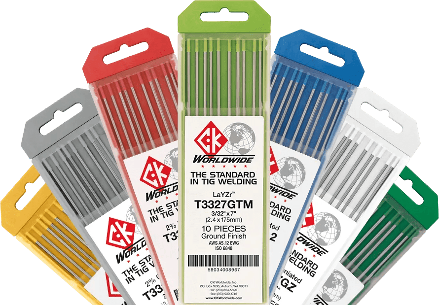 Seven packs of CK Worldwide - Tungsten 1/16 Layzr (T1167Gtm) are fanned out, each with a distinct colored top—red, gray, gold, green, blue, black, and orange—and clear labels showing 1/16 LaYZr Tungsten welding electrodes.