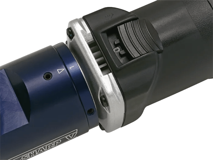 Close-up of the CK Worldwide Tungsten Electrode Grinder Ts10-230 showing its blue metallic body labeled SHARP V, silver collar, black textured handle, and a ridged black sliding switch on top of the handle section.