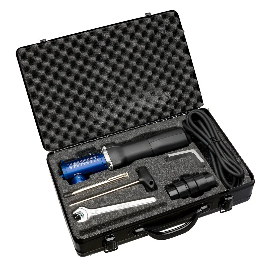 The CK Worldwide Ts10 Tungsten Electrode Grinder comes in a black hard case with egg crate foam, organized to hold the blue and black grinder, power cable, two hex keys, wrench, rods, nozzle, and cylindrical attachment.