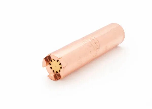 A copper-colored shotgun slug with a star-shaped yellow insert at the tip and four partially split prongs, resembling a heavy-duty heating tip, isolated on a white background.