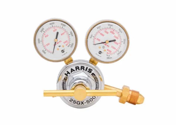 A brass single stage regulator with two pressure gauges labeled “HARRIS 25GX-500.” The gauges show psi and kPa readings, making it ideal as an HVAC pressure regulator. A brass connector is featured on the right.