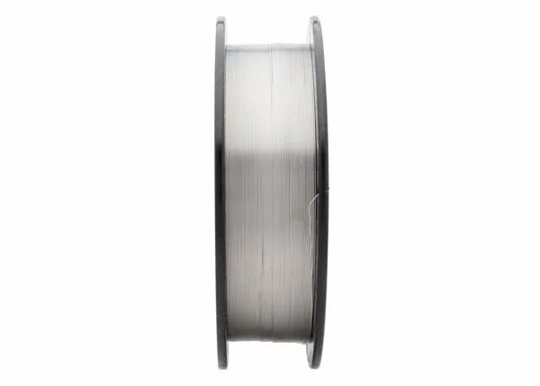 A side view of a Harris 308 Stainless Steel MIG (GMAW) Welding Wire, 0.025 in (0.64 mm), 10 lb spool (0030815), featuring dark rims and reflective silver wire, stands upright against a white background—ideal for GMAW welding.