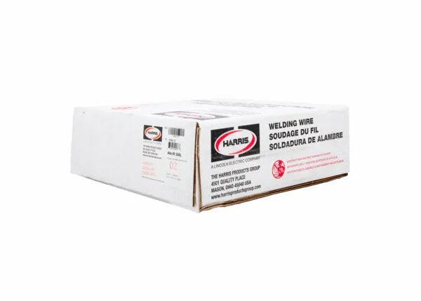 A white rectangular box labeled “Harris 308L Stainless Steel MIG Welding Alloy - 0308L18” displays the Harris logo, with English and Spanish text including “Welding Wire” and “Soldadura de Alambre.”.