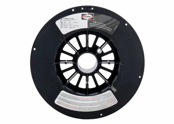 A black plastic spool with spoke-like openings holds Harris 308LT1-1 Dynacore Stainless Flux-Cored FCAW Welding Wire .035 x 25# (308LFCF8). White and red labels with specs are attached, photographed against a white background.