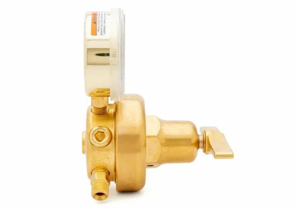 Side view of a brass high-pressure oxygen regulator with a round gauge on top, a small lever handle, and several pipe fittings, isolated on a white background. Ideal for high-flow cylinder applications.