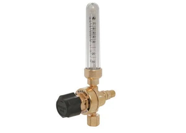 The Harris 3100333 - 351-70Ar/CD regulator is a brass pipeline flowmeter for Argon/CO₂ with a clear vertical tube marked Ar, graduated markings, left-side black adjustment knob, and brass fittings for versatile gas regulation.