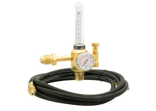 A brass Argon regulator with a pressure gauge, flowmeter kit, and black flexible hose attached, commonly used for welding or shielding gas-powered tools.