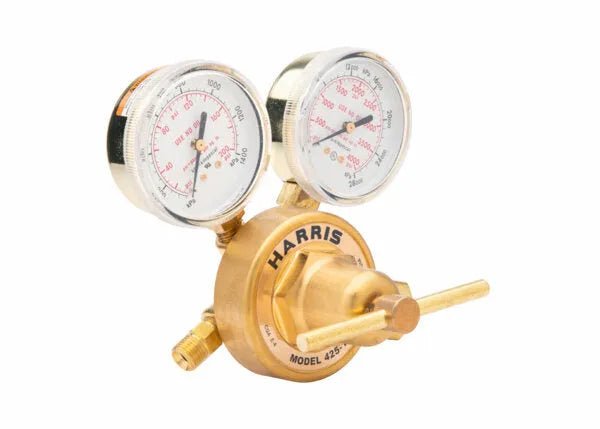 A Harris 425 single stage regulator, with two round pressure gauges on top, labeled “HARRIS” and “Model 425,” features adjustment knobs and connectors for precise control of gas flow—ideal as a medical air regulator.