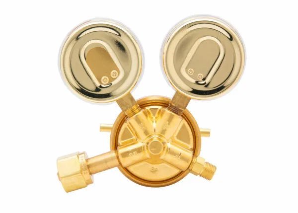 A Harris 425 single stage regulator for medical air, featuring two round pressure gauges and connection fittings, viewed from above against a white background.