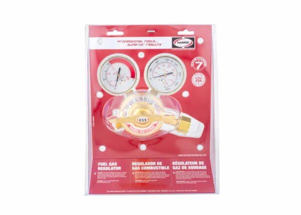 Harris 450-15-300 welding pressure regulator with dual gauges, shown boxed with English and French details, red and white background.