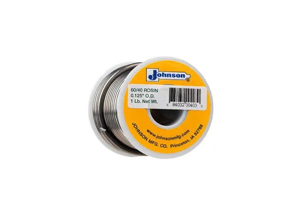 A spool of Harris 604061 60/40 leaded solid wire solder, 1/8 in (3.2 mm) diameter, 1 lb, is neatly wound and labeled for electronic soldering, featuring product details and a barcode.