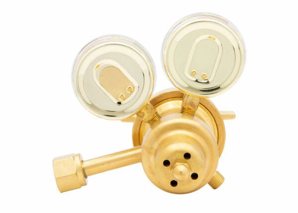 A brass Oxygen regulator for welding applications, featuring two circular pressure gauges with clear covers and gold-colored faces, and a connector. Ideal for laboratory industrial use. Isolated on a white background.