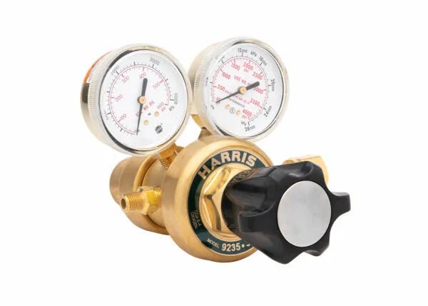 Harris 9235-350-540 manifold two-stage oxygen regulator with dual gauges, ideal welding equipment accessory, on white background.