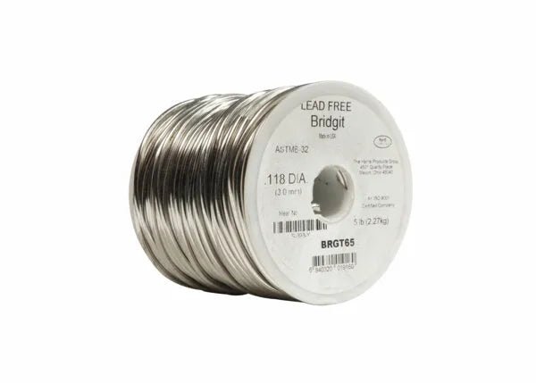 A spool of Harris BRGT65 Bridgit Lead-Free Solid Wire Solder, 0.118 in (3.0 mm) diameter, shown against a plain white background. The metallic spool displays product and safety information on its label.