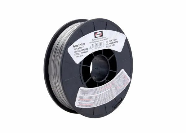 A spool of Harris Dynashield E71T11 1F5 .035 gas-shielded flux-cored welding wire (10 lb) on a black plastic reel with white product and safety stickers, tightly wound against a white background.