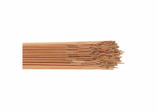 A bundle of uncooked whole wheat spaghetti noodles lies horizontally against a white background, resembling Harris ER70S-3 Mild Steel TIG GTAW Welding Rods (1/8, 10# Box - E70S360) with their uneven ends and light brown color.