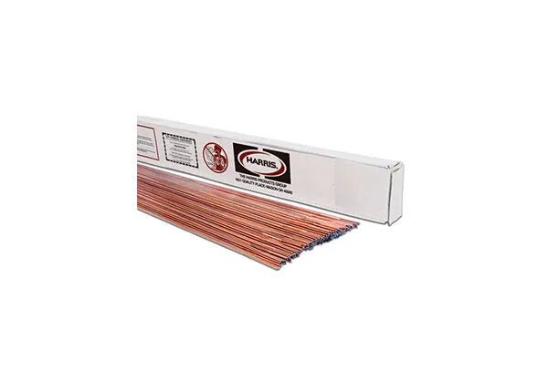 A stack of shiny, copper-colored Harris ER80SD-2 Low Alloy Steel TIG GTAW Welding Rods (3/32, 10# PKG - 80SD250) is partially pulled from a long white box displaying product info and branding, with rods neatly aligned.