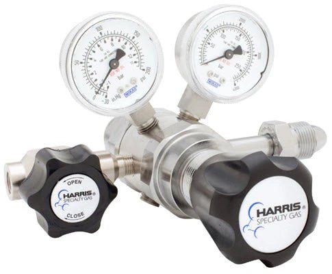 Harris 742-500-580-A welding regulator with dual gauges, black knobs, metal body for Argon, Helium, Neon, Nitrogen cylinders.