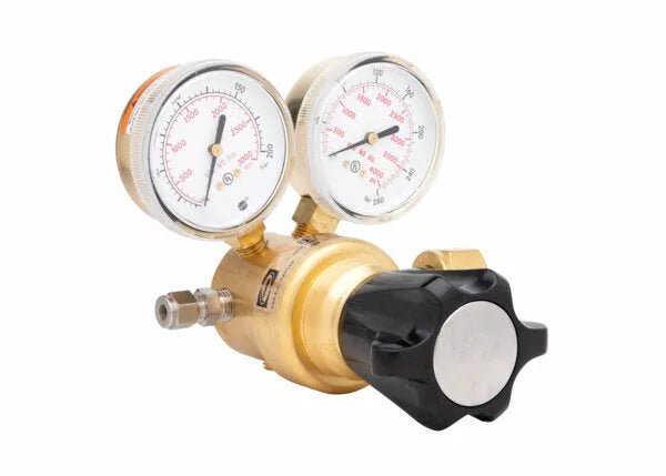A single stage brass regulator with two round pressure gauges and a large black adjustment knob, designed for controlling gas flow from high pressure cylinders in welding or laboratory applications, isolated on a white background.