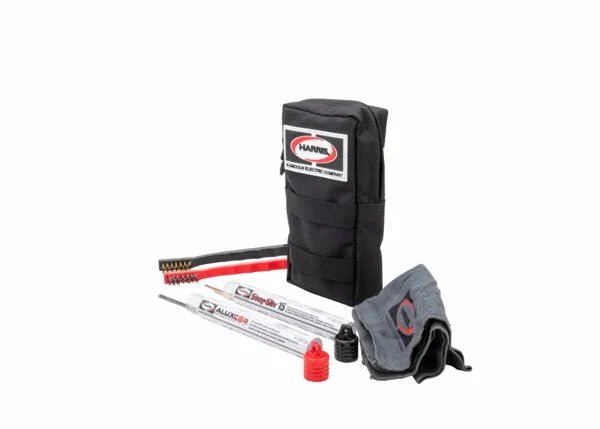 The Harris H-1000-B kit includes a black branded pouch with a red/black cleaning rod, brush, two solution tubes, small red container, and gray cloth—everything needed for HVAC brazing repairs with Aluxcor or Stay-Silv 15.