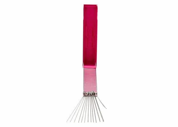 The Harris King Tip Cleaner - 2010690 is shown upright with a pink rectangular handle and fine metal wires extending from the bottom. The smooth, shiny handle stands out against the plain white background.