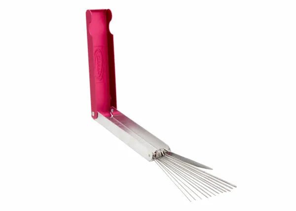 The Harris King Tip Cleaner - 2010690 features a red plastic upright handle and fanned metal prongs, resembling a tip cleaner, to securely hold onions for safe slicing. Shown against a plain white background.
