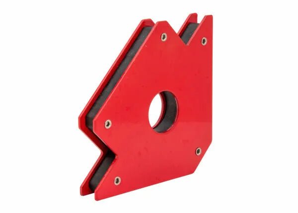 The Harris Magnetic Holder - Medium - MAGFXMD is a red, right triangle-shaped magnet with angled sides, a central circular hole, and edge screws. It supports metal pieces at various angles for welding or assembly tasks.