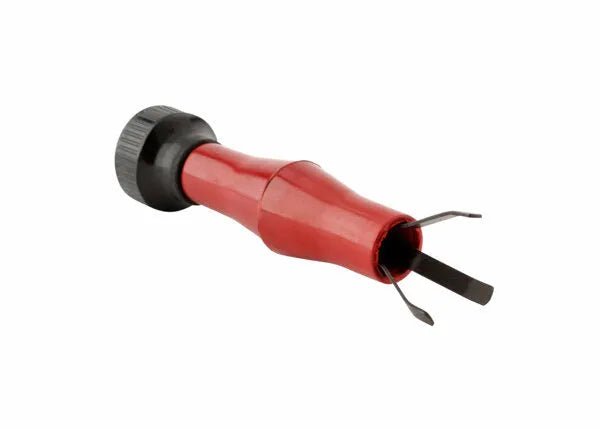 The Harris MIG Nozzle Cleaner - 3060030, featuring a red handle, black textured grip, and two flat metal prongs, is displayed against a white background and is designed for safe removal of integrated circuits from sockets.