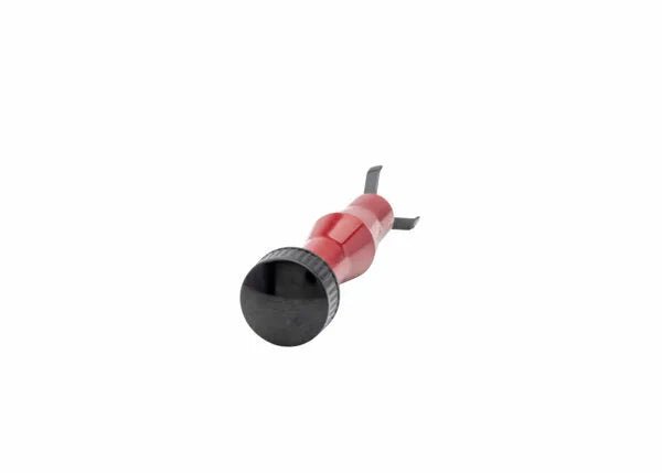 The Harris MIG Nozzle Cleaner - 3060030 is a red, cylindrical handheld tool with a black textured grip and two metal prongs, displayed angled on a white background for easy viewing.