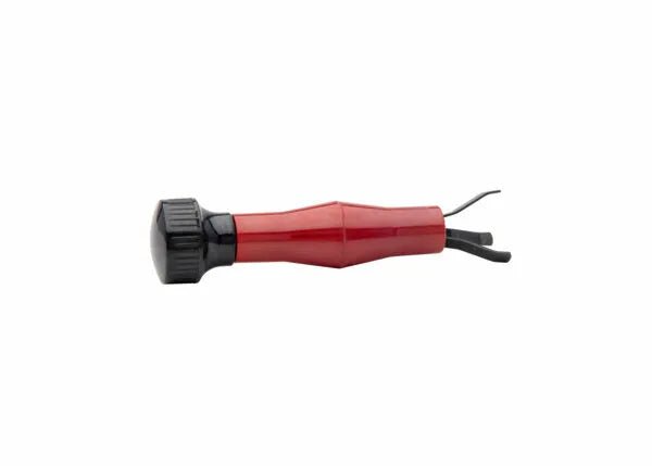 The Harris MIG Nozzle Cleaner - 3060030 is a red and black handheld tool with a cylindrical handle, textured black cap, and an angled metal prong designed for prying or removing spatter inside welding nozzles.