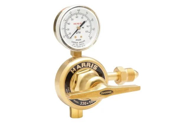 A brass Harris flowgauge regulator with a pressure gauge on top displaying PSI and CFH readings, labeled for argon and carbon dioxide. Designed for high pressure cylinders, it features adjustment knobs and connection fittings.