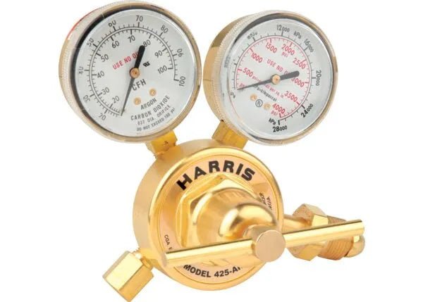 A Harris Model 425 brass single stage flowgauge regulator with two pressure gauges and labeled dials, used for controlling the flow and pressure of gases like argon and carbon dioxide in welding applications.
