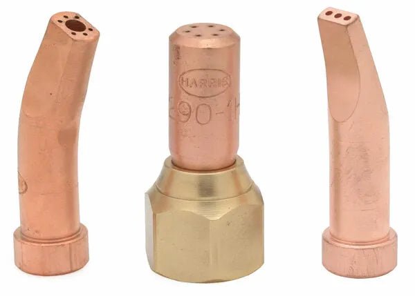 Three copper oxy-acetylene welding torch tips are shown upright on a white background, including a specialty gouging tip and others designed for use with Harris cutting torch equipment in heavy duty acetylene gouging applications.