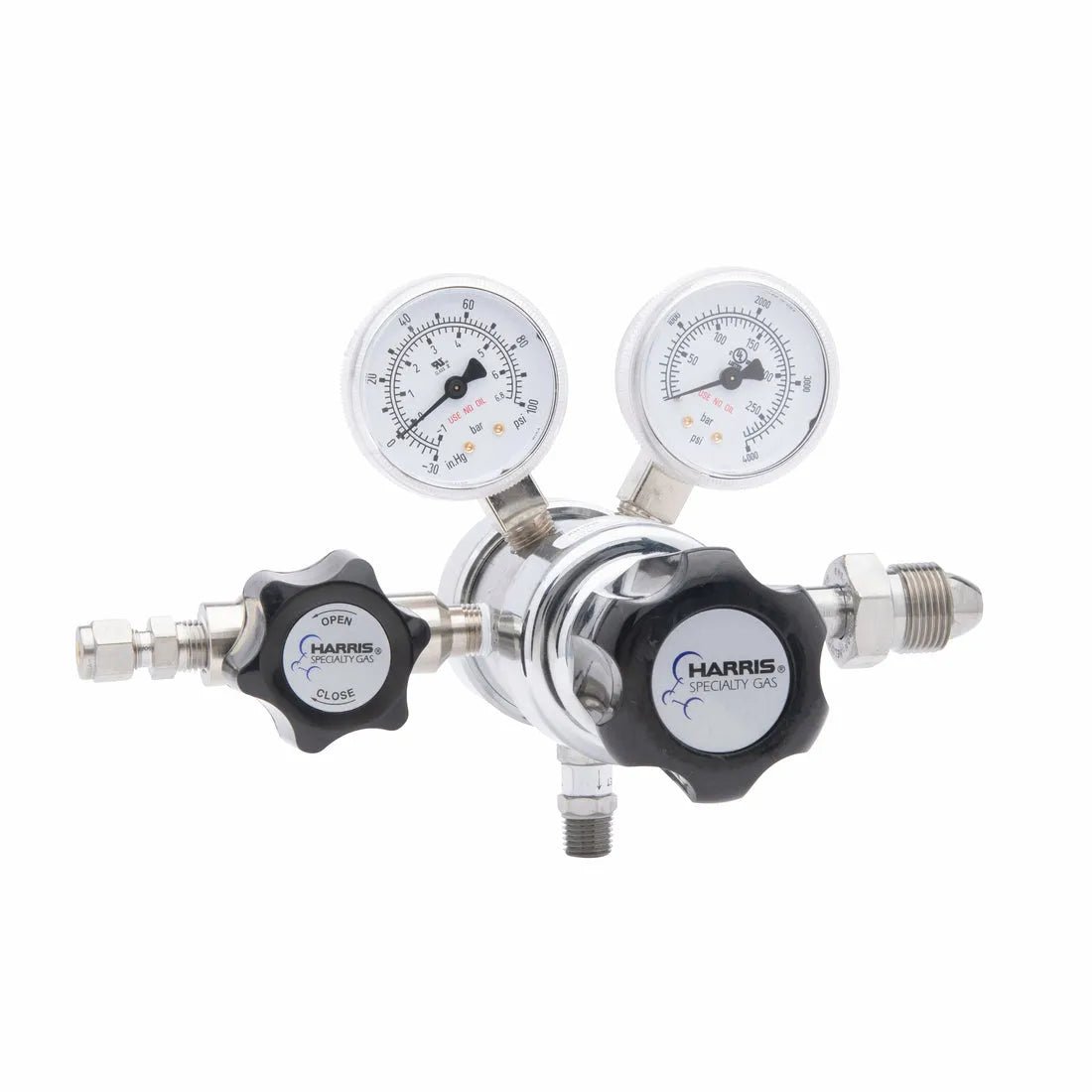 The Harris 702-050-580-BE Regulator is a stainless steel, high-purity gas regulator with two pressure gauges, dual black HARRIS SPECIALTY GAS knobs, and metal fittings for precise Argon, Helium, Neon, or Nitrogen flow control in laboratories.