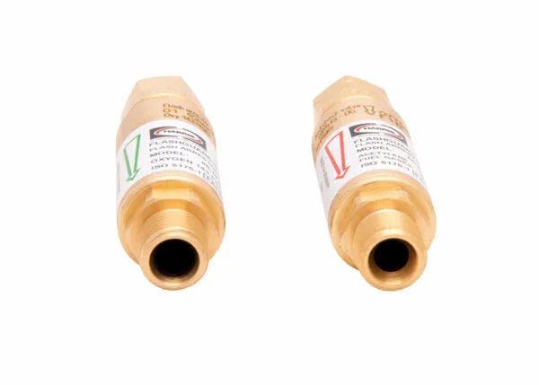 Two regulator-type flashguard brass flashback arrestors with labels and colored arrows—one green for oxygen and one red for fuel gas—are shown side by side on a white background.