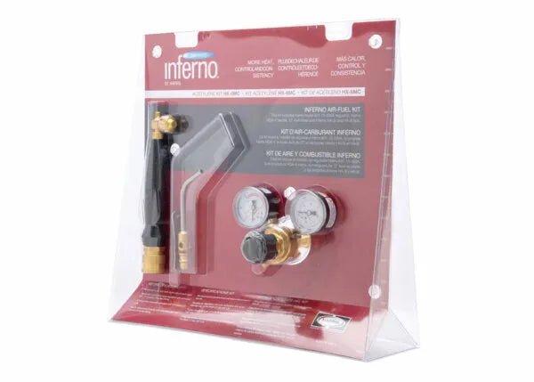 The Harris Model Hx-5MC HQA-4 601-200 Quick Connect A-Hose Inferno Kit (4400087) features a torch handle, brass fittings, two pressure gauges, regulator, and acetylene hose arranged in a clear case with red backing.