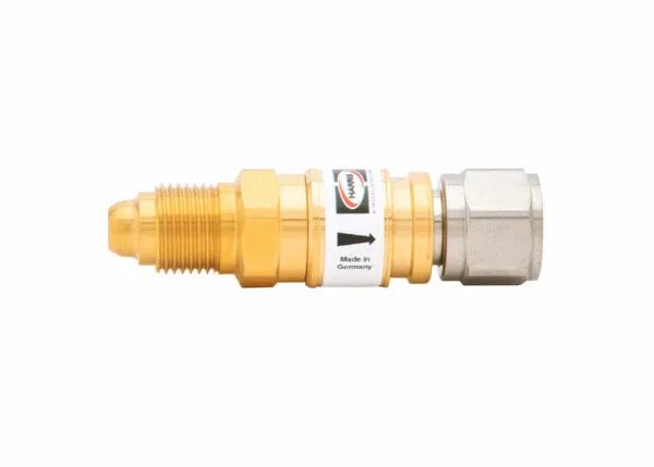 The Harris Model IQC F-M Hose-to-Machine Type Quick Connector (4301614) has a brass body, threaded ends, hexagonal nut, silver quick connector on the right, and a white Made in Germany label with black arrow around the center.