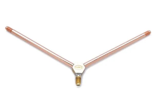 Two copper rods joined at a central hexagonal brass connector, forming a V shape, similar to the Harris TH-50-2 twin tip tube design, with threaded ends on each rod and a larger threaded section on the connector’s base.