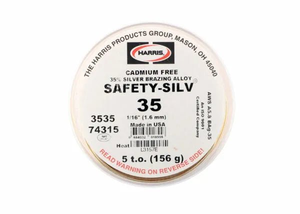 A round container labeled “Harris 3535 - Safety-Silv 35 Silver Brazing Alloy - 1/16 in (1.6 mm) - 5 toz Cup” contains a cadmium-free, 35% silver alloy made in the USA (AWS A5.8 BAg-35). Label warns: READ WARNING ON REVERSE SIDE.